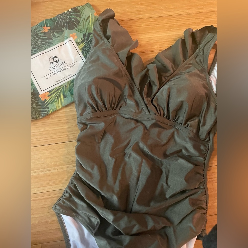 Brand new CUPSHE swim suit. Size Small.  One piece. Khaki.